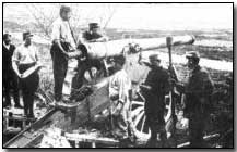 Belgian artillery positioned behind a canal