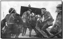 British howitzer crew in the Balkans wearing gas gear