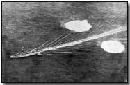 Allied destroyer dropping twin depth charges