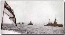 British fleet heading out to sea, HMS Iron Duke leading