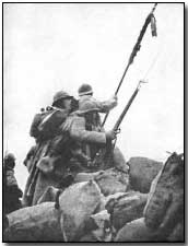 French soldiers going over the top, 9/25/15, Mesnil les Hurlus, Champagne. Last photograph of Colonel Desgrees du Lou (with flag), killed during attack
