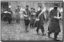 French prisoners with morning soup ration